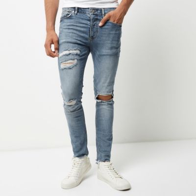 Light blue wash ripped Sid skinny jeans